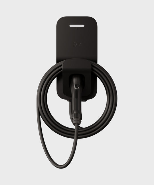 FLO Home X3 Black home EV charger with J1772 connector, front view , connector in holster, white background