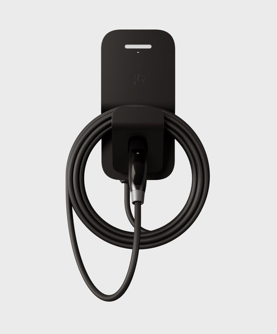 FLO Home X3 Black home EV charger with J3400 NEMA connector, front view, connector in holster, white background
