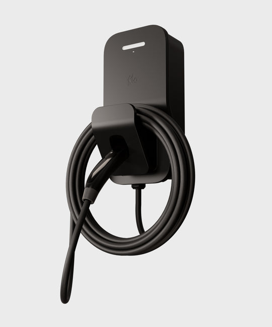 FLO Home X3 Black home EV charger with J3400 NEMA connector, side view, white background