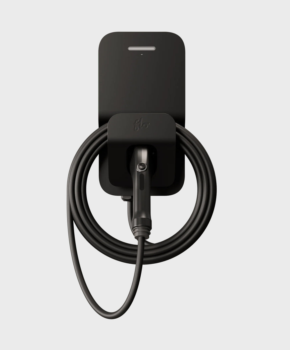 A black FLO Home X8 EV charging station, J1772 charging connector, front view, white background